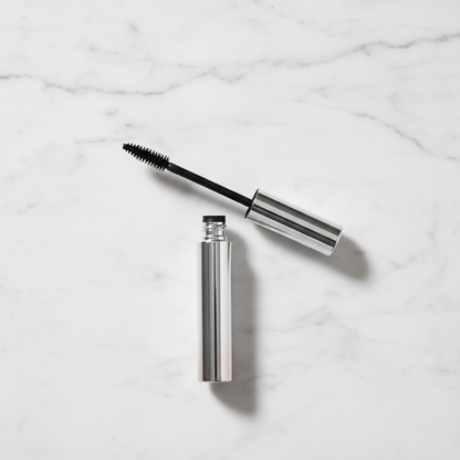 Noir Amplify Mascara - overhead top view showing open tube and brush